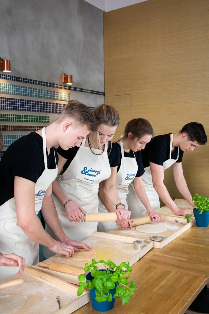 participants of a Polish dumplings cooking class at work